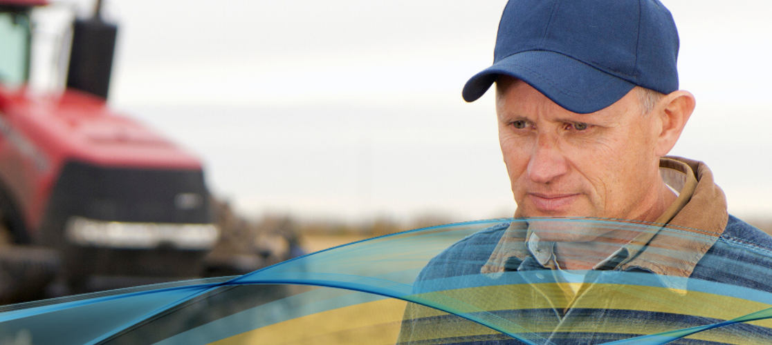 Stock image of distressed looking farmer in field