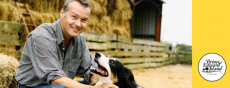 Image of farmer and his dog with PEI wordmark